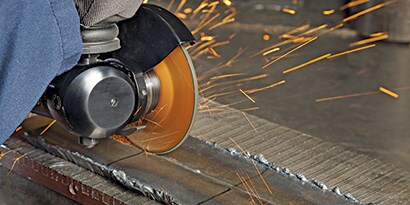 A close-up of a grinding machine
