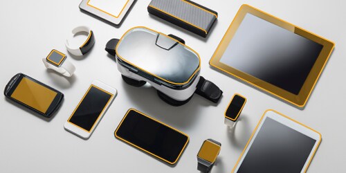 Modern electronic gadgets and devices are arranged in a grid pattern.
