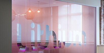 An interior glass wall covered with 3MTM Glass Finishes creates a distinct space with visual interest.
