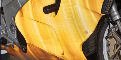 Close-up of a yellow and black vehicle
