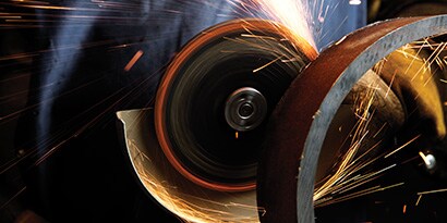 A close-up of a grinding machine
