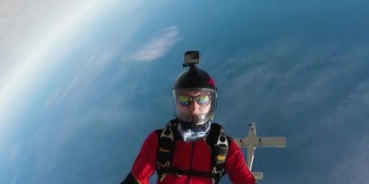 Skydiver midday with a GoPro camera
