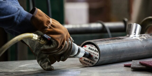 Operator deburring with Scotch-Brite Deburr & Finish Pro