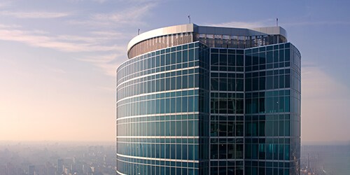 High-rise building against the evening sky.
